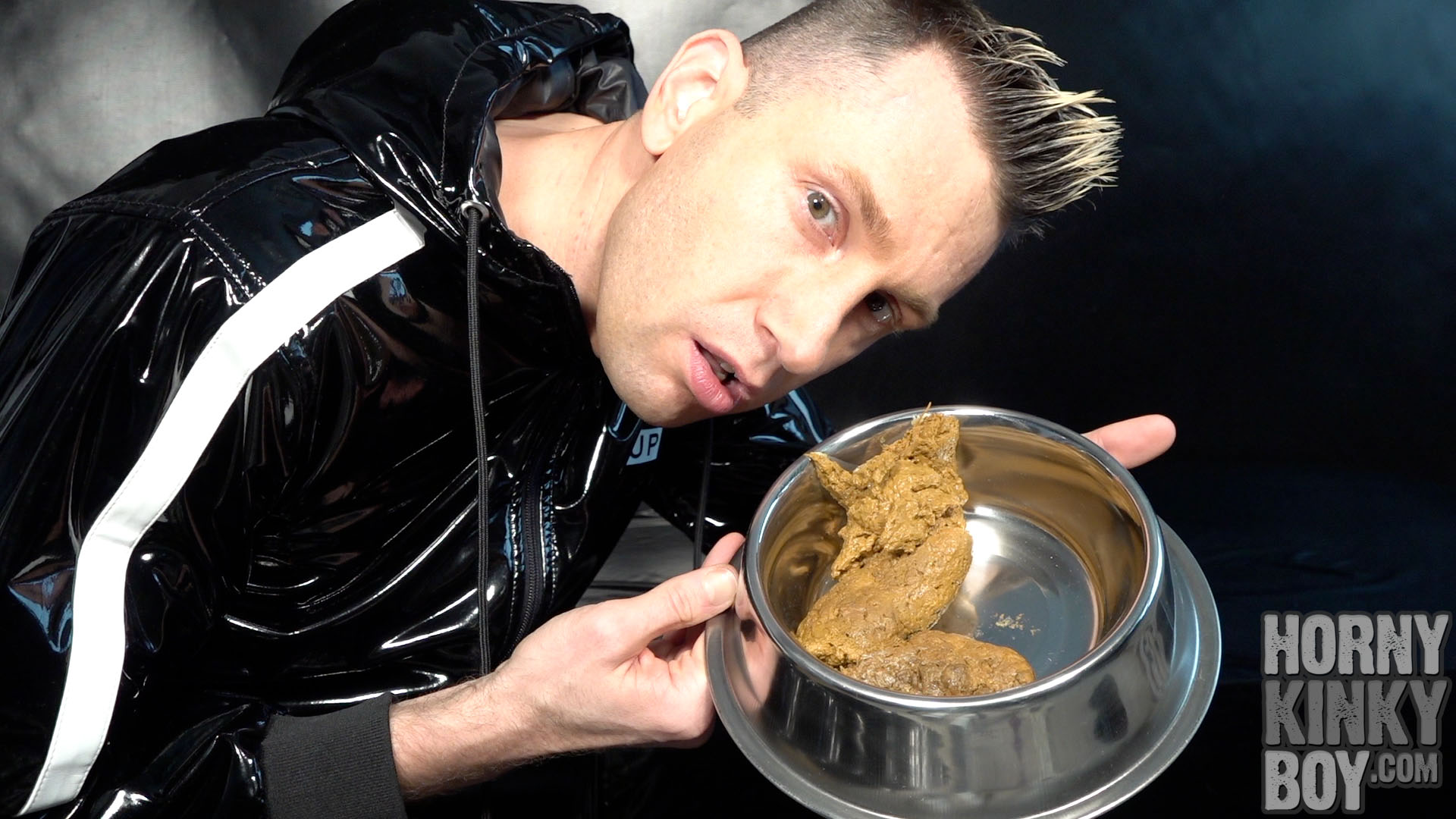 PVC Boy Eats Shit and Cum from a Dog Bowl